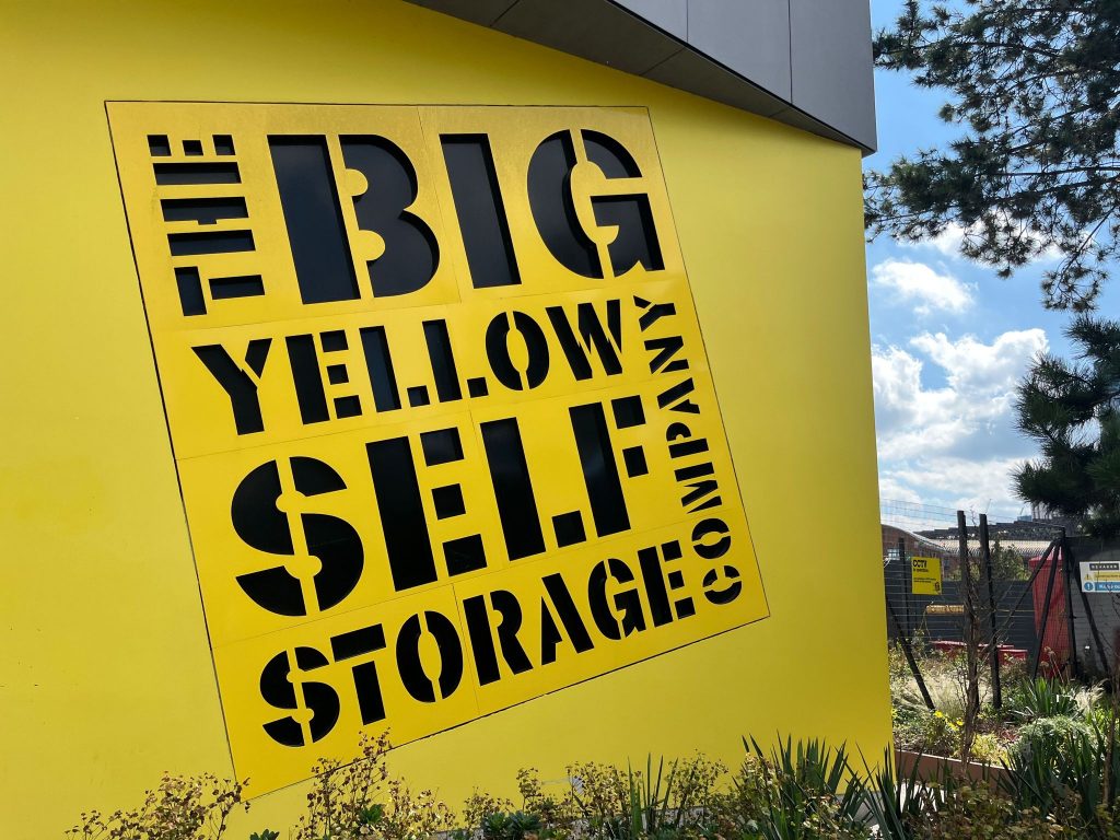 big yellow storage exterior sign with company name