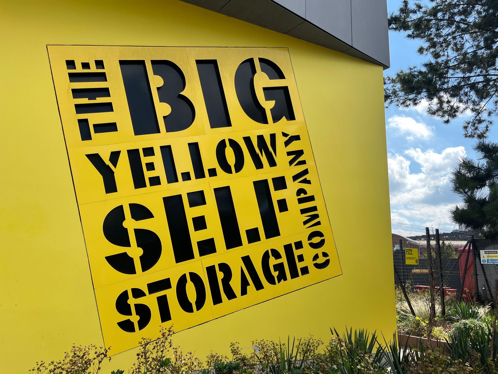 big yellow storage exterior sign with company name